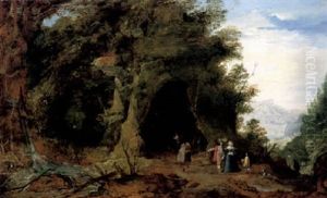 A Wooded Landscape With Elegant Figures And A Monk Before A Grotto by Joos de Momper the Younger