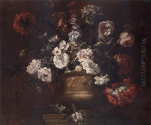 Roses, Delphiniums, Carnations, Peonies, Narcissi, And Other Flowers In A Sculpted Urn On A Stone Ledge
