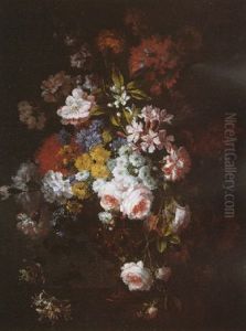 A Still Life Of Roses, Cornflowers, Orange Blossom, Honeysuckle And Other Flowers In A Moulded Bronze Vase On A Stone Ledge