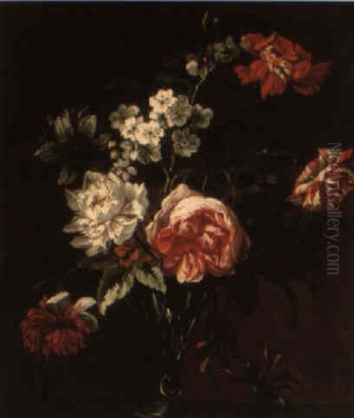 Roses, Tulips And Carnations In A Glass Vase On A Ledge - view 1
