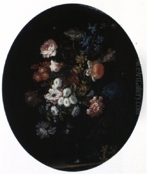 Pink Roses And Other Flowers In A Glass Vase On A Ledge - view 1