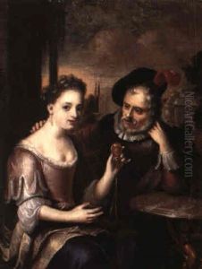 An Elderly Man And A Lady Holding A Pending At A Table In A Garden