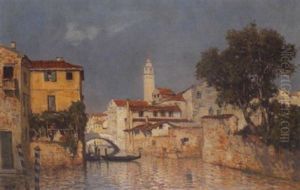 A View Of A Venetian Canal With A Gondola In The Foreground