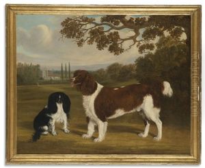 A Toy Spaniel And A Springer Spaniel In A Landscape, A Church In The Distance