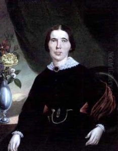 Woman Seated In A Green Upholstered Chair