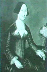 Portrait Of A Seated Lady Wearing A Green Dress With A Pink Bow by William Neuser