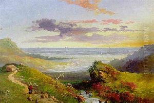 A Figure Walking Along A Coastal Path