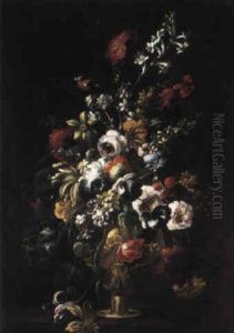 Flowers In Sculpted Urn On Ledge