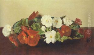 A Dish With Red And White Begonias