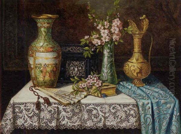 An Elaborate Carafe, Two Cases And A Casket On A Lace Draped Table - view 1