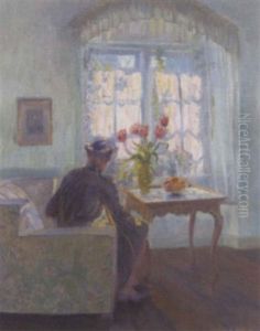 A Woman Seated In A Interior By A Vase Of Tulips by Robert Panitzsch