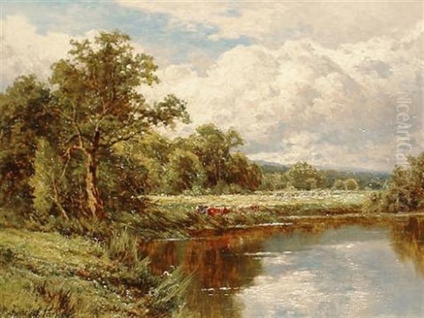 Cattle Feeding Beside A River - view 1