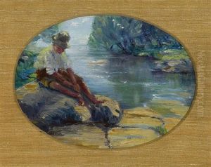 A Boy Sitting On Rocks By A River