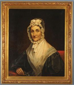 Portrait Of Elderly Woman In Bonnet Holding Glasses