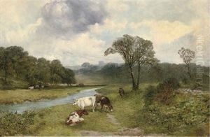 Cattle Grazing Beside The River Wye, With Haddon Hall Beyond