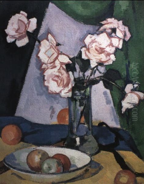 Pink Roses In A Glass Vase With Fruit In A Bowl Against A Green Drape - view 1