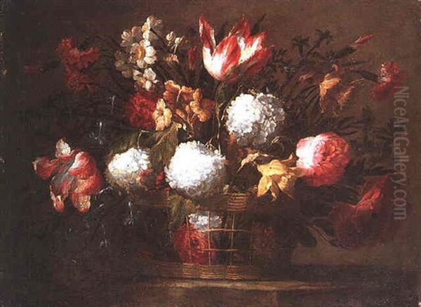 A Still Life Of Tulips, Daffodils, Narcissi, Carnations, Roses And Bluebells In A Wicker Basket On A Stone Ledge - view 1