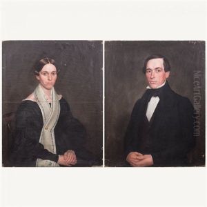 Portraits Of A Gentleman And Lady by Ammi Phillips