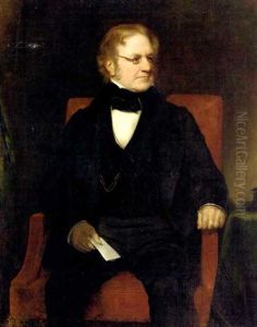 Portrait Of Thomas Richter Seated In A Black Suit With Paper In His Right Hand