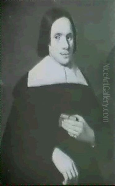 Portrait Of A Young Man Holding A Book - view 1