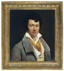 Portrait Of A Young Man Wearing A Yellow Scarf