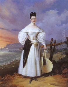 Portrait De Jeune Femme Tenant Son Chapeau Devant Une Cote Rocheuse