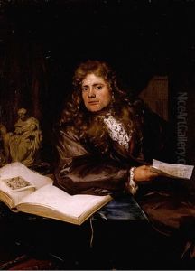 Portrait Of A Collector In His Study, Seated At A Table, Holding A Drawing And Surrounded By Sculptures And A Drawing Folio