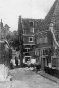 A Quiet Street Scene In A Village by Geo Poggenbeek