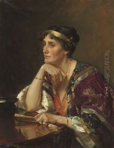 A Portrait Of Mrs Radcliffe, At A Table In An Oriental Gown by Alfred Priest