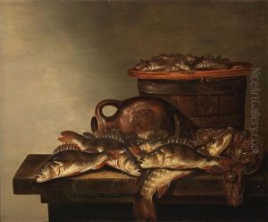 Fish, A Fishing Basket And Net On A Table-top by Pieter de Putter