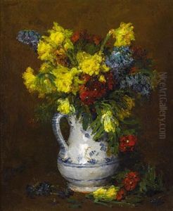 A Blue And White Vase With Mixed Flowers