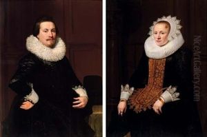 Portrait Of A Gentleman In A Black Coat And Lace Collar (+ Portrait Of A Lady In A Black Dress With Gold Trim And A Lace Collar And Headdress; Pair) by Jan Anthonisz Van Ravesteyn
