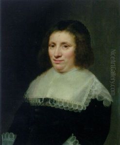 Portrait Of A Lady (maria Reigersbergen?) In A Black Dress With A Lawn Collar And Cuffs by Jan Anthonisz Van Ravesteyn