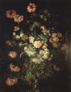 Flowers In A Sculpted Urn On A Table