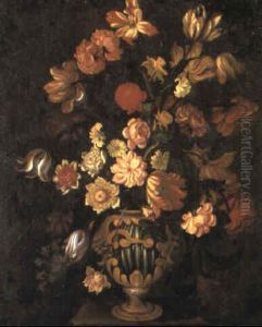 Tulips And Other Flowers In A Vase On A Stone Plinth With Masks by Giacomo Recco