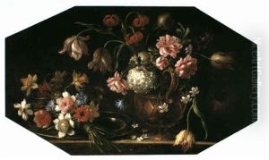 A Still Life Of Flowers Including Tulips, Lilies And Roses  In A Gilt Urn Upon A Ledge With A Posy Of Daffodils And by Giacomo Recco