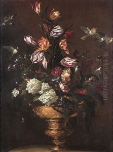 Tulips, Hydrangeas, A Peony, A Poppy And Other Flowers In A Moulded Bronze Urn On A Stone Ledge With A Blue Tit, A Chaffinch And A Robin