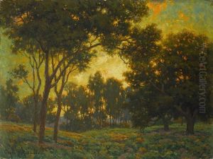 Sunset Through The Trees by Granville S. Redmond