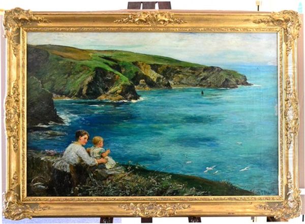 Mother And Child Seated On Headland Looking Out To Sea - view 1