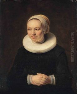 Portrait Of A Lady, Half-length, In A Black Dress, With White Ruff, Lace Cuffs And White Headdress by Harmenszoon van Rijn Rembrandt