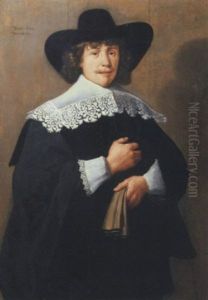 Portrait Of A Gentleman In A Black Broad-rimmed Hat And Black Costume With A White Lace Collar And Cuffs And Hat, His Gloves In His Left Hand by Harmenszoon van Rijn Rembrandt