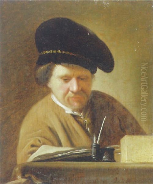 A Man In A Black Cap Reading At A Table - view 1