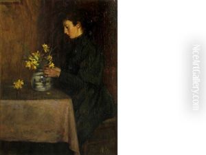 A Woman Arranging Flowers by Ernest Higgins Rigg