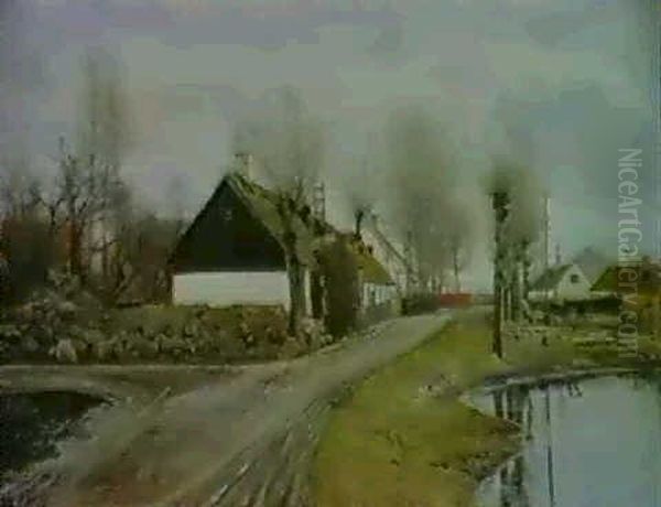 Vej Ved Gadekaeret I Baldersbronde. Gra Skyer, Vand I Forgrunden Til Begge Sider... - view 1