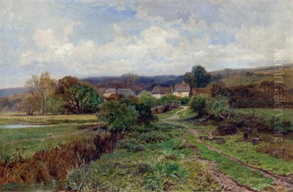 Young Girl With Man Chopping Wood In Field With Distant Village - view 1