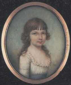 A Young Girl Wearing Low-cut White Dress With Frilled Trim And Blue Ribbon Waistband
