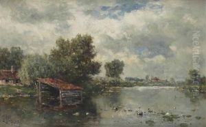 A View Of A River With A Boat House And Water Lilies