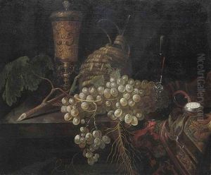 An Elaborately Decorated Vase, A Pocket Watch, Grapes, A Carafe And A Glass Cup On A Partly Draped Table by Pieter Gerritsz van Roestraten