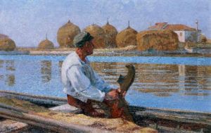 Man In A Boat Looking Across A Canal