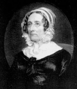 Mrs. Howard Of Brereton Hall, Seated In A Red Upholstered Chair, Wearing Spectacles, Black Dress With White Collar And Frilled Bonnet Tied Beneath Her Chin by Sir William Charles Ross